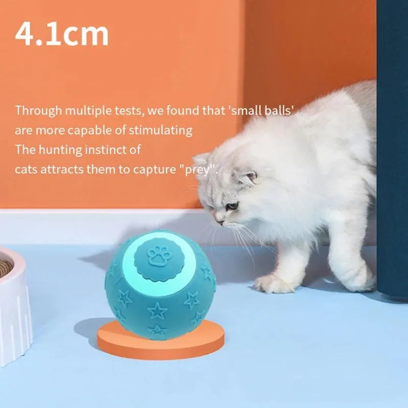 Blue smart ball cat toy with rechargeable feature and rolling motion on a floor