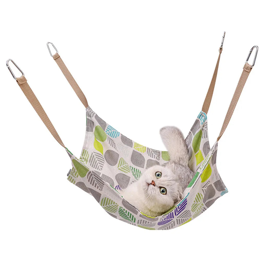 Yellow cotton linen cat hammock with metal hanging hook, shown suspended.