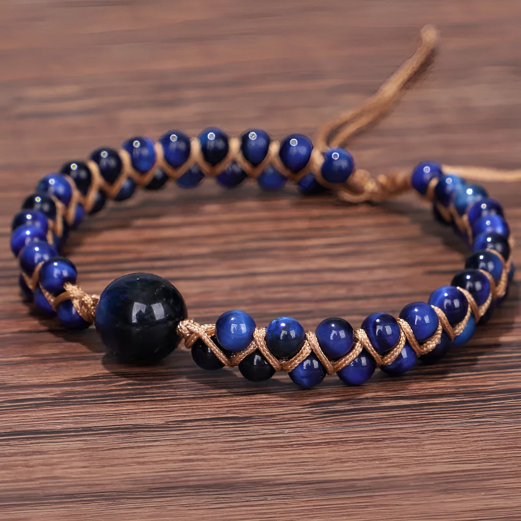 Handmade woven geometric pull bracelet with Tigereye and Amethyst beads in blue and purple colours