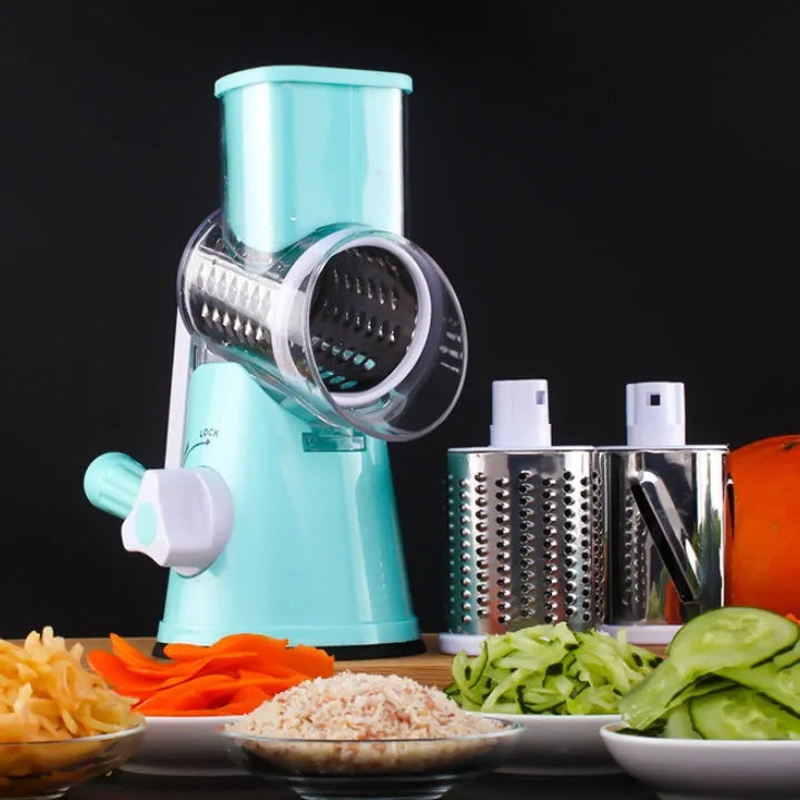 Round manual kitchen mandoline slicer with stainless steel blades in blue, green, or red colour options