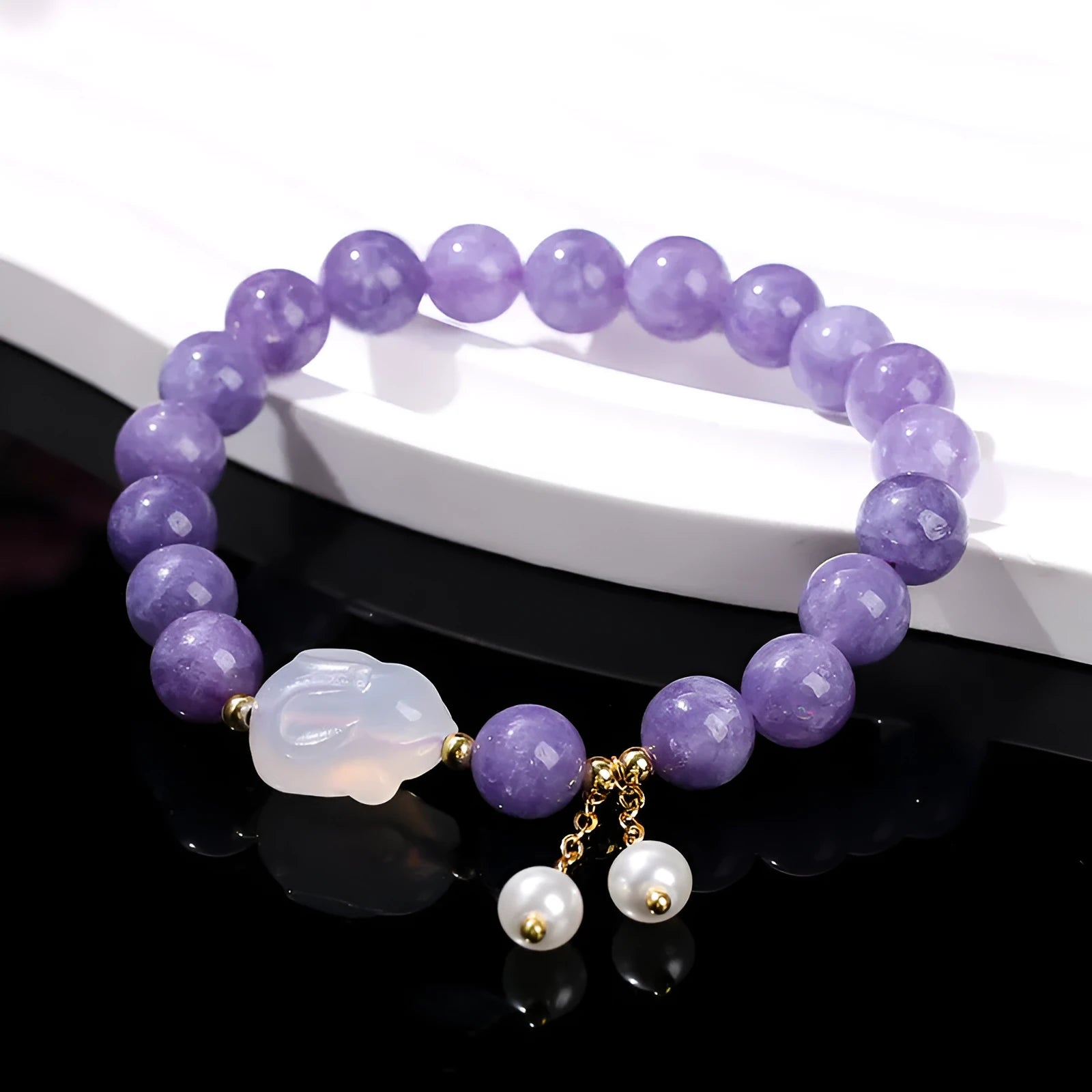 Purple geometric bracelet with aquamarine and lychee jelly agate beads in 6mm, 8mm, and 12x16mm sizes.