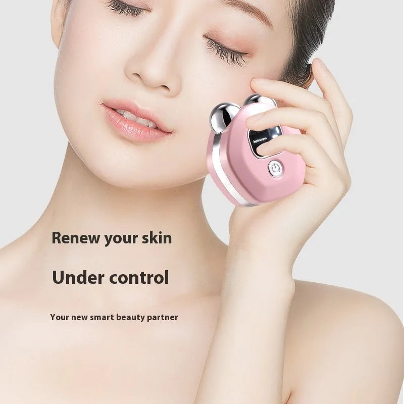 Portable white hot compress massage instrument with a double-roller head for facial micro current treatment.