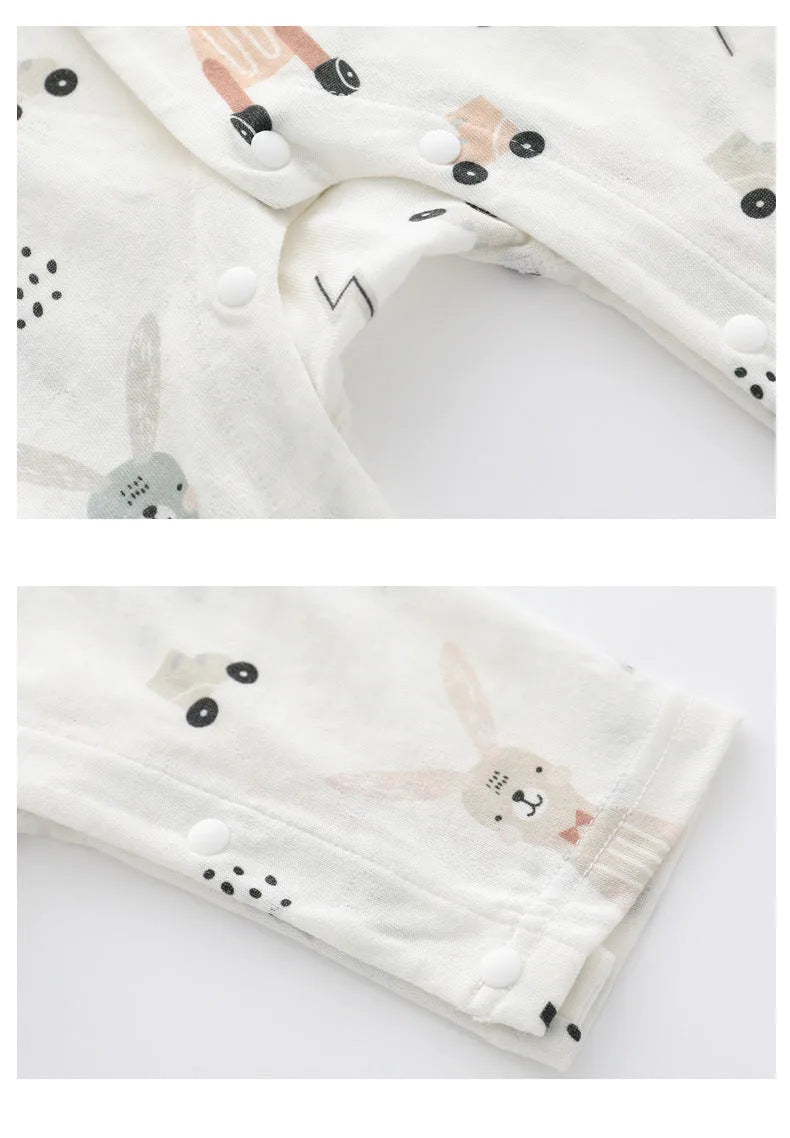 Baby wearing a soft bamboo fibre jumpsuit with a cute Nordic animal print, long sleeves.