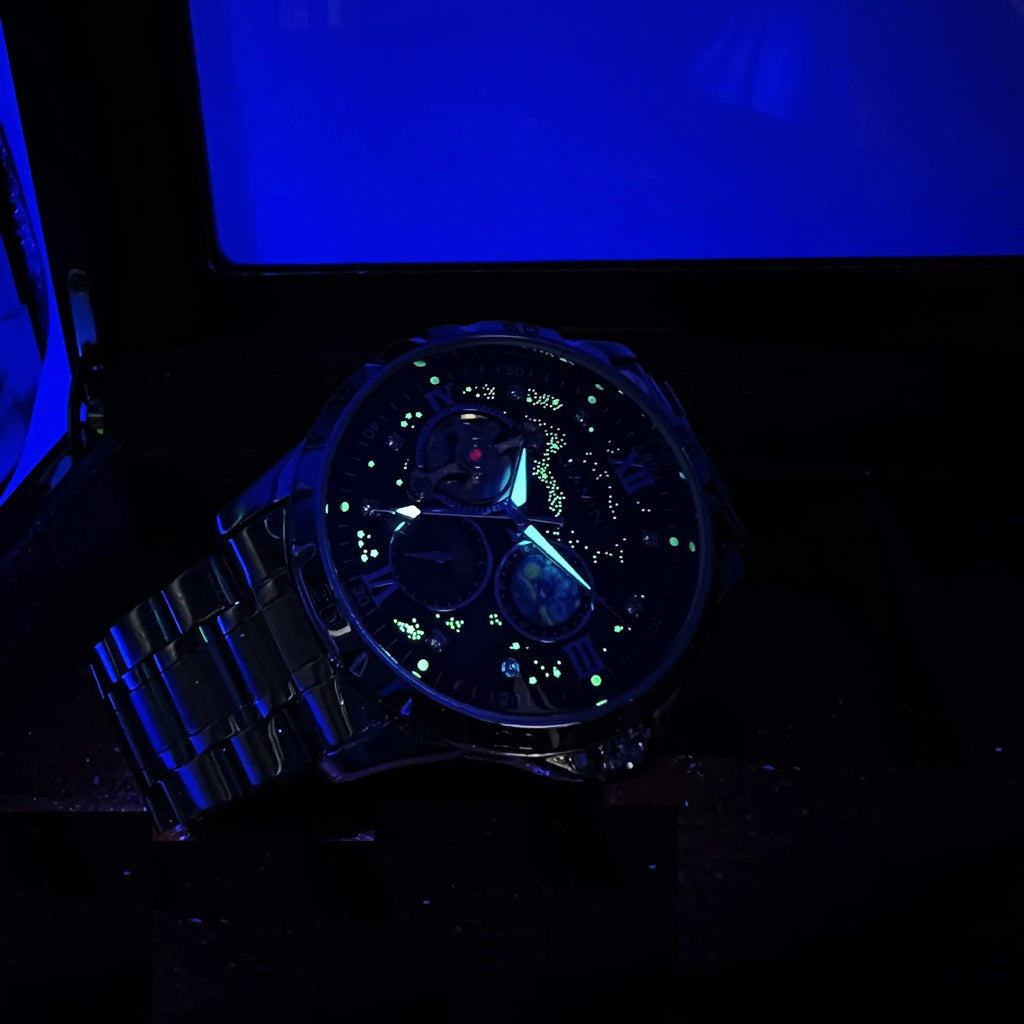 Men's rose gold and black automatic mechanical watch with a large 42mm dial on a leather strap
