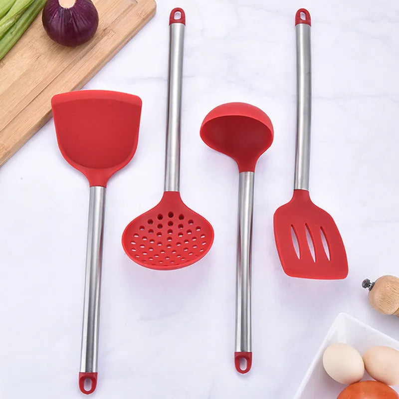 Seven-piece silicone kitchenware set includes spatula, colander, egg beater and other utensils with stainless steel tube handles in red colour