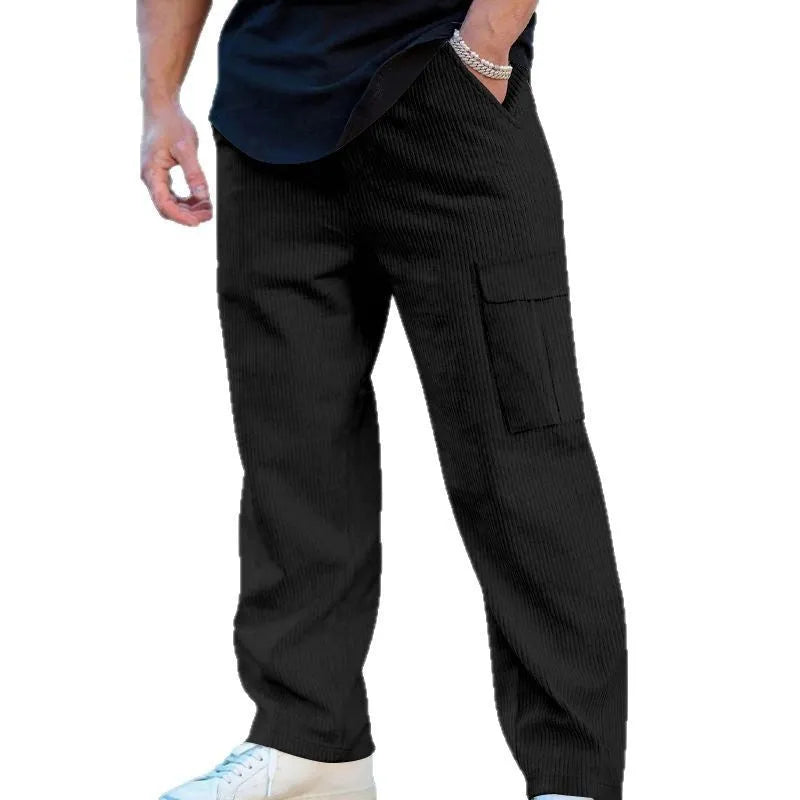 Men's straight-leg corduroy trousers in navy blue with an elasticated drawstring waist.