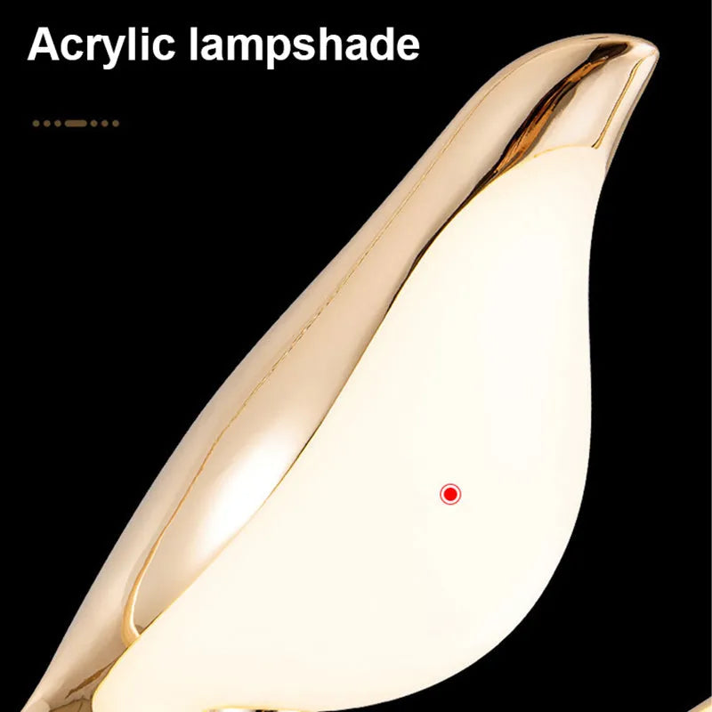 Modern linear magpie bird chandelier with zinc alloy frame and acrylic details, 150cm long.