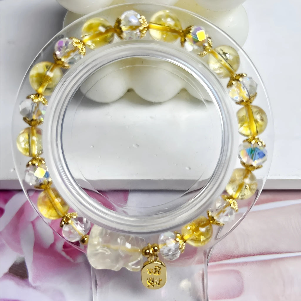 Handmade women's bracelet featuring a nine-tail fox design made from natural citrine crystals.