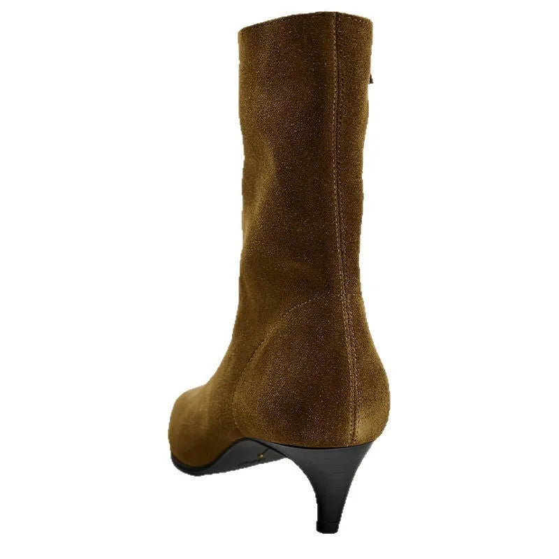 Brown square toe kitten heel mid-calf boots with side zipper on a wooden floor.