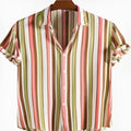 Man wearing a digitally printed short sleeve polyester shirt in a solid colour for summer.