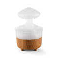 Wood grain rain cloud shaped ultrasonic humidifier and essential oil diffuser with coloured LED lights.