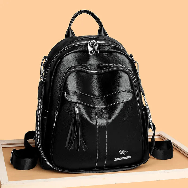 Genuine leather hand-held tassel backpack in khaki with stitching and fringe detail