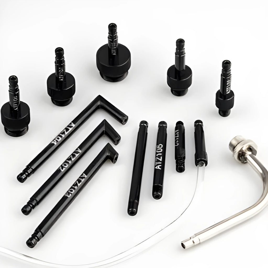 A 13-piece automatic transmission oil refuelling kit with a manual pump, hoses, and connectors laid out.