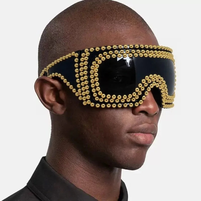 Men's silver square sunglasses with large rim, rivet details on arms, on a plain background.