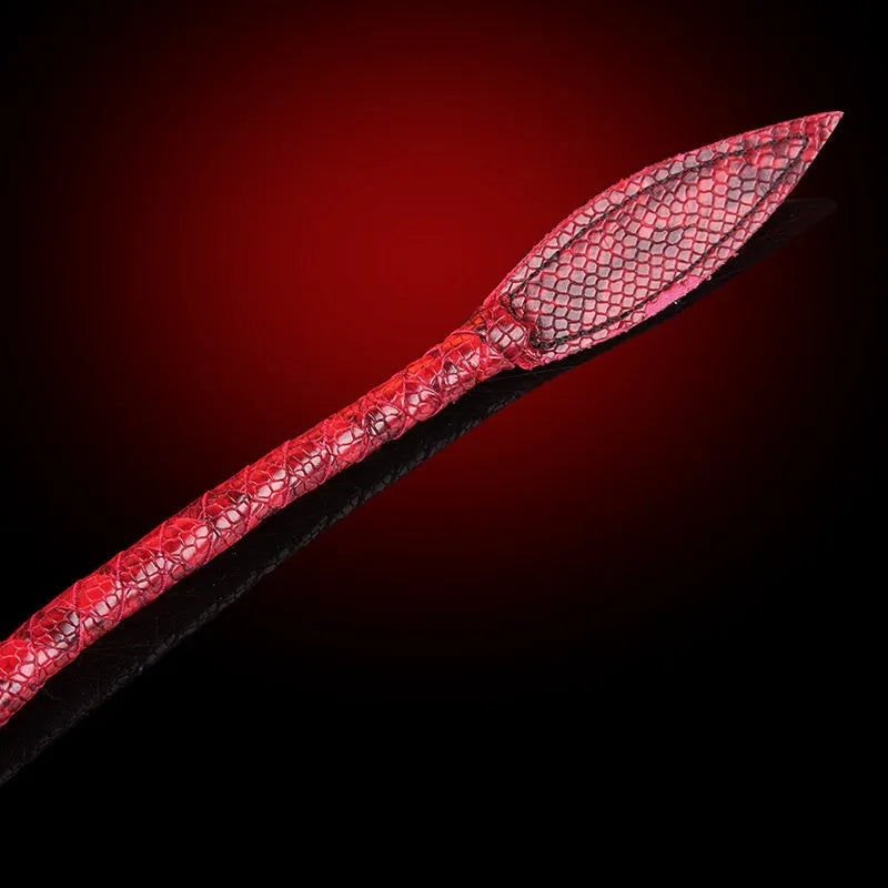 Red PU willow leaf whip BDSM training tool on black background