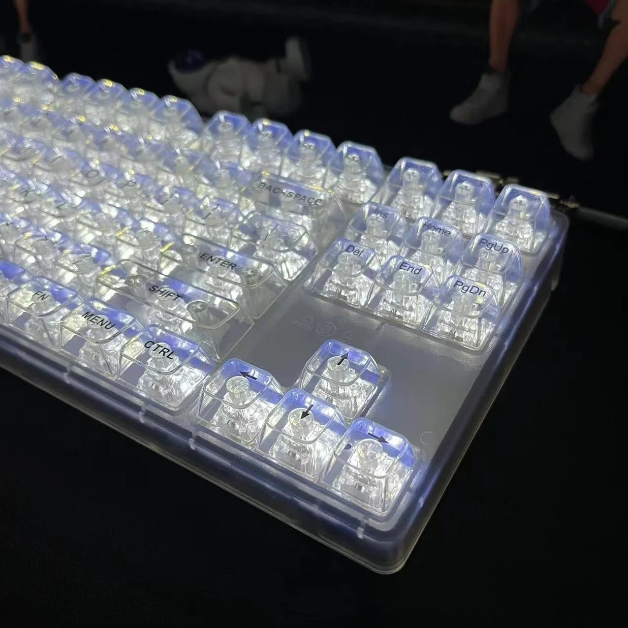 132 transparent plastic key caps arranged for mechanical keyboard replacement