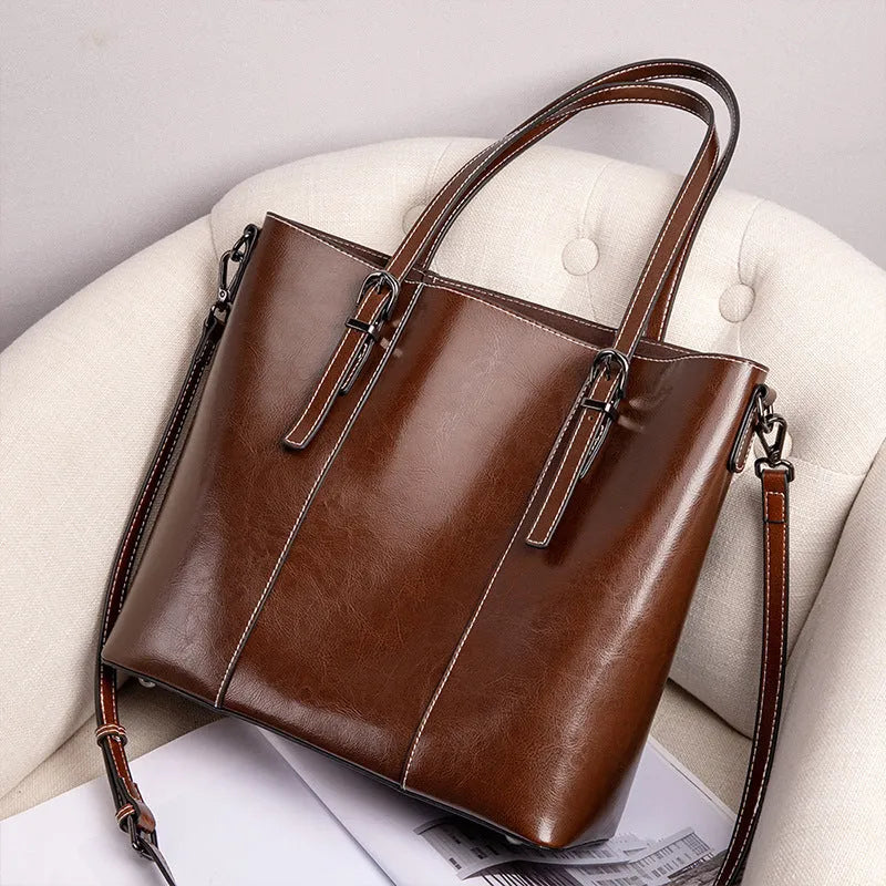 Brown genuine leather women's retro shoulder bag with three straps and horizontal square shape