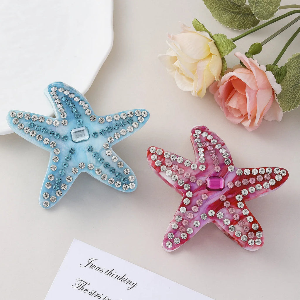 Acrylic starfish diamond encrusted hairpin in blue and pink colours length 8cm