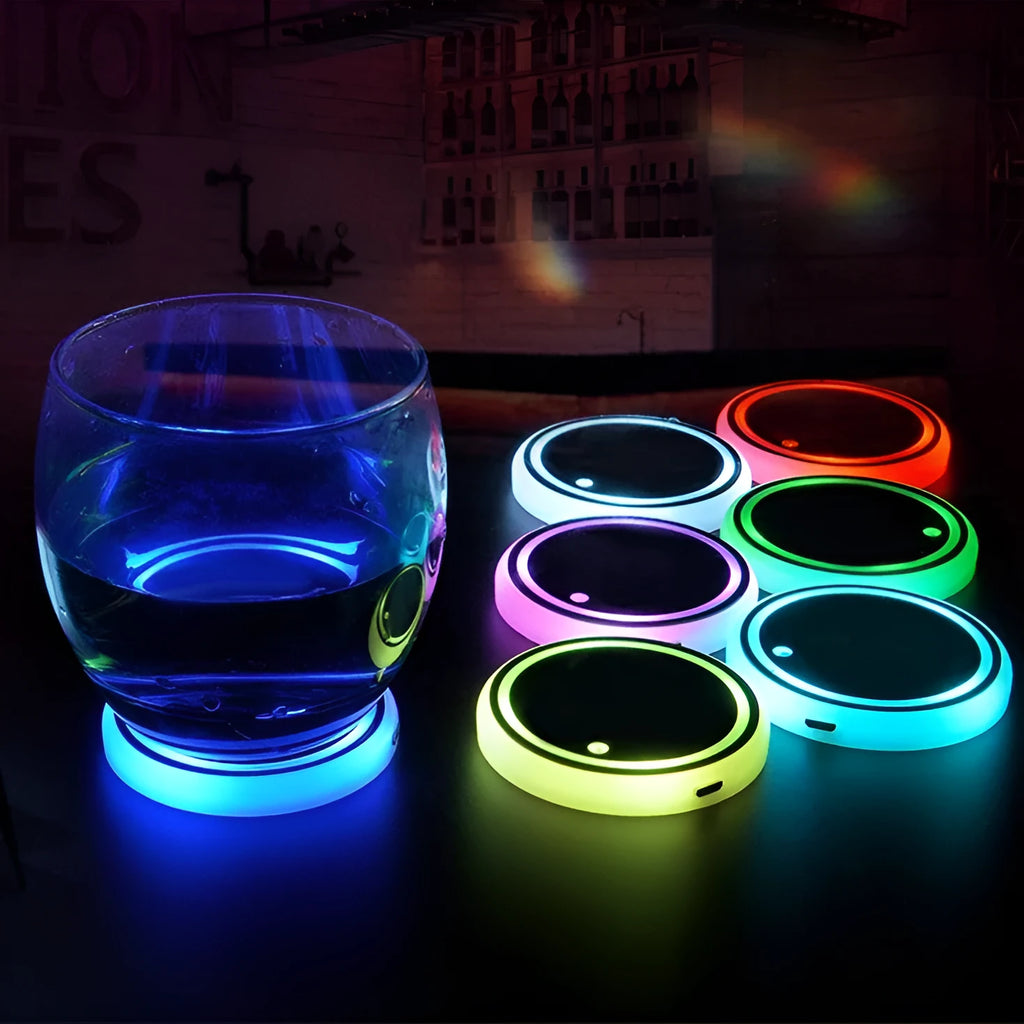 Colourful LED light-up car cup holder coaster with solar panel and USB charging port.