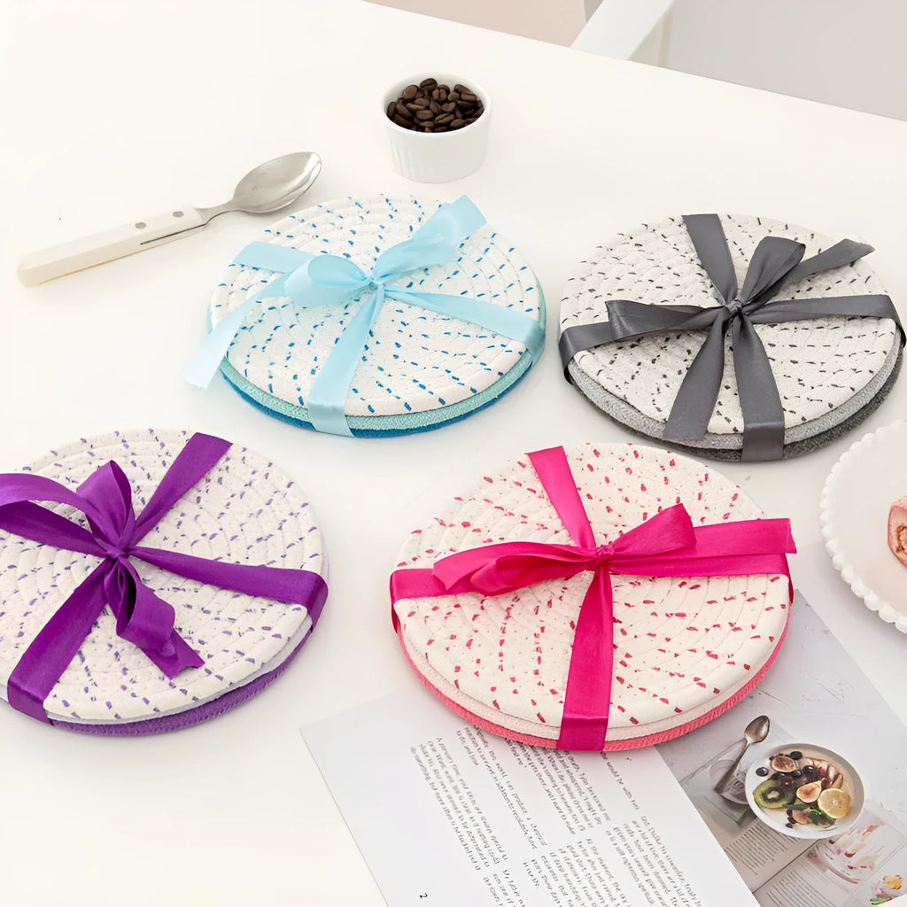Three round cotton cord coasters in blue colour with modern simplicity design