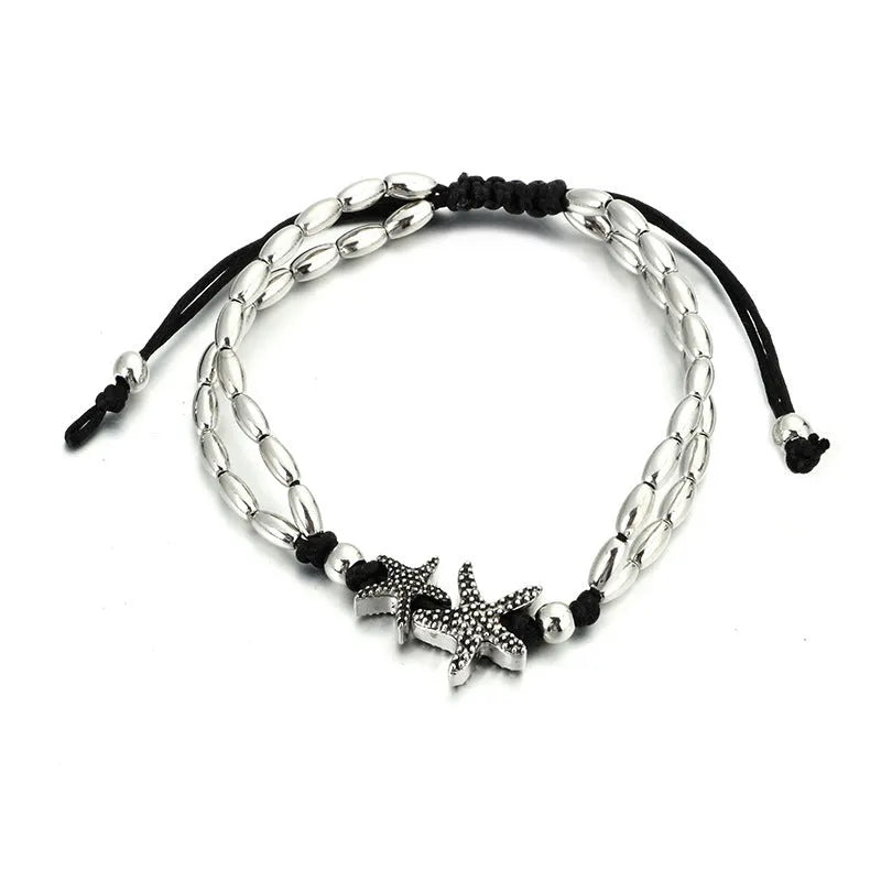Silver-tone starfish anklet made from electroplated alloy, 17cm length with 10cm tail chain.