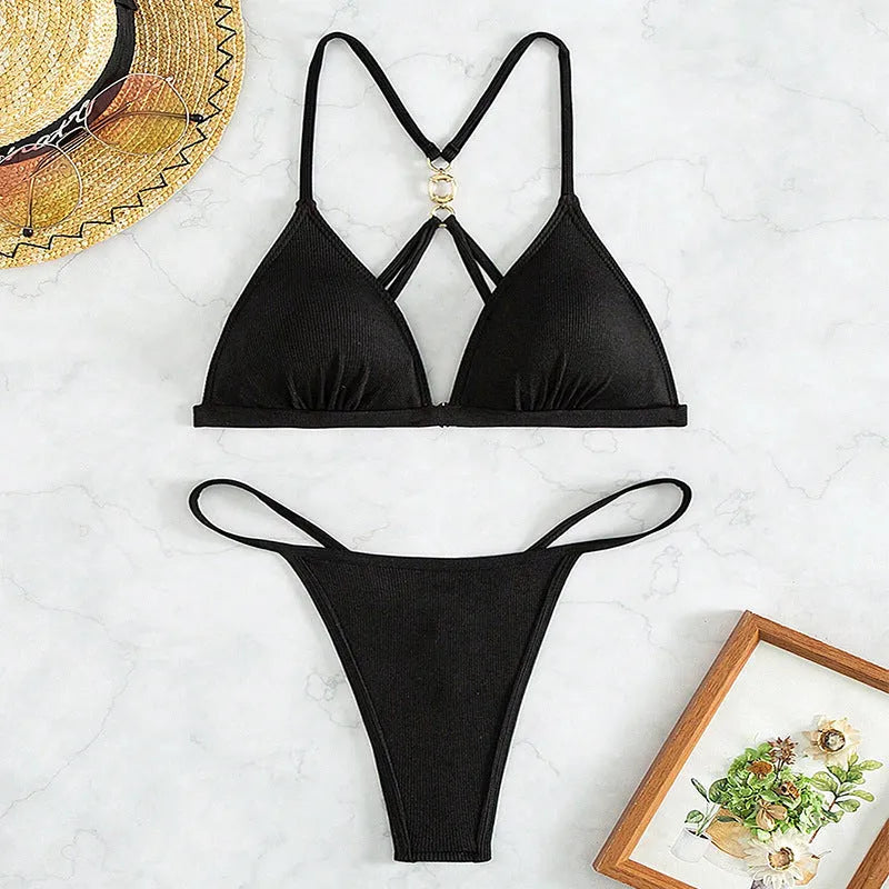 Black women's hollow backless triangle bikini set on a mannequin, showing front and back views.