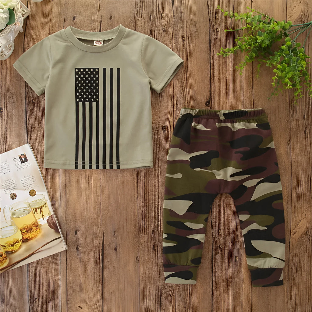A little boy's camouflage print short sleeve shirt and pants summer suit set.
