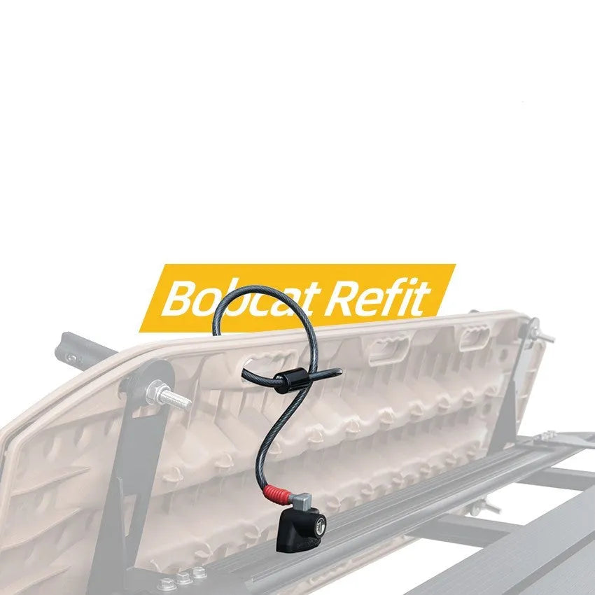 Plastic-sheathed steel cable lock for securing equipment to a roof platform without drilling.