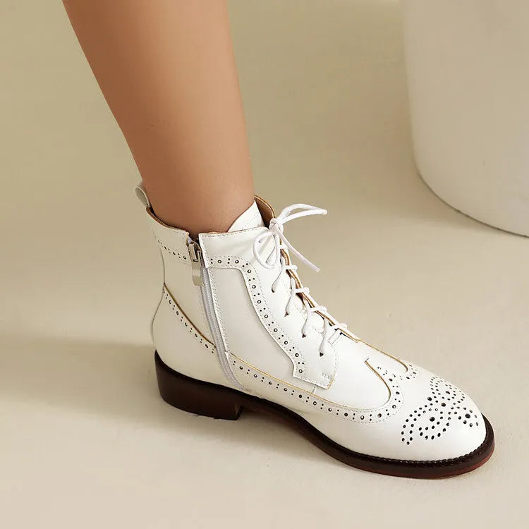 Women's black classic boots with chunky short stout heel, pointed toe, ethnic totem pattern, and middle calf length