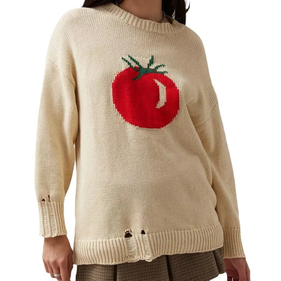 Women's milky white acrylic jacquard pullover sweater with round neck and long sleeves laid flat.