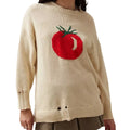 Women's milky white acrylic jacquard pullover sweater with round neck and long sleeves laid flat.