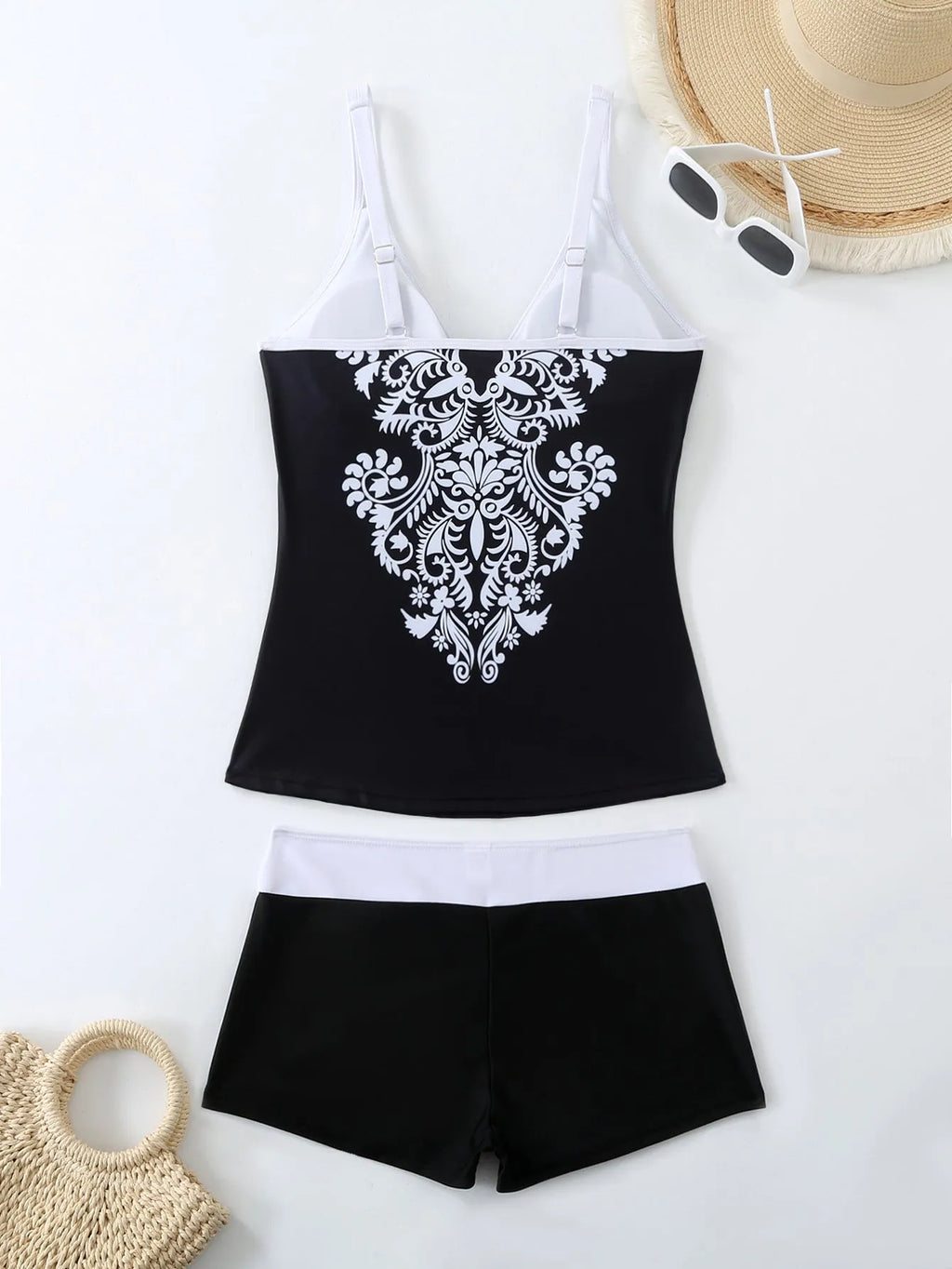 Women's black plus size split print brief swimsuit with a cotton lining.