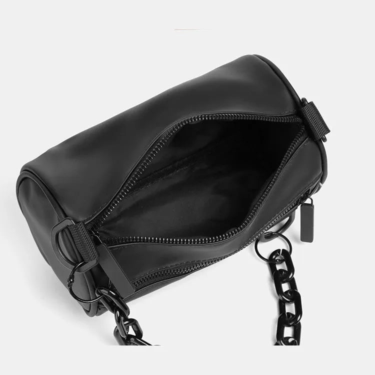 Black casual messenger bag with chain detail and crossbody strap made from Oxford cloth.