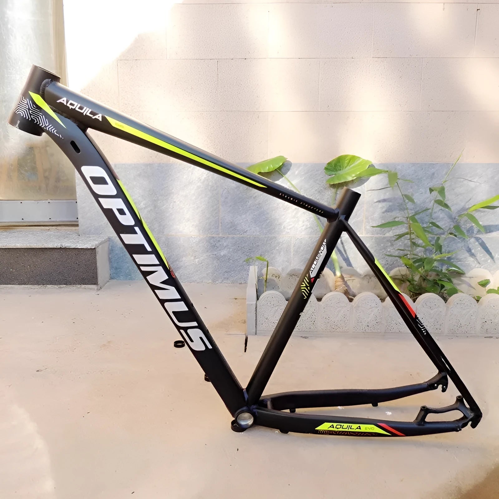 Black green aluminium mountain bike frame with inner cable routing and disc brake mounting points
