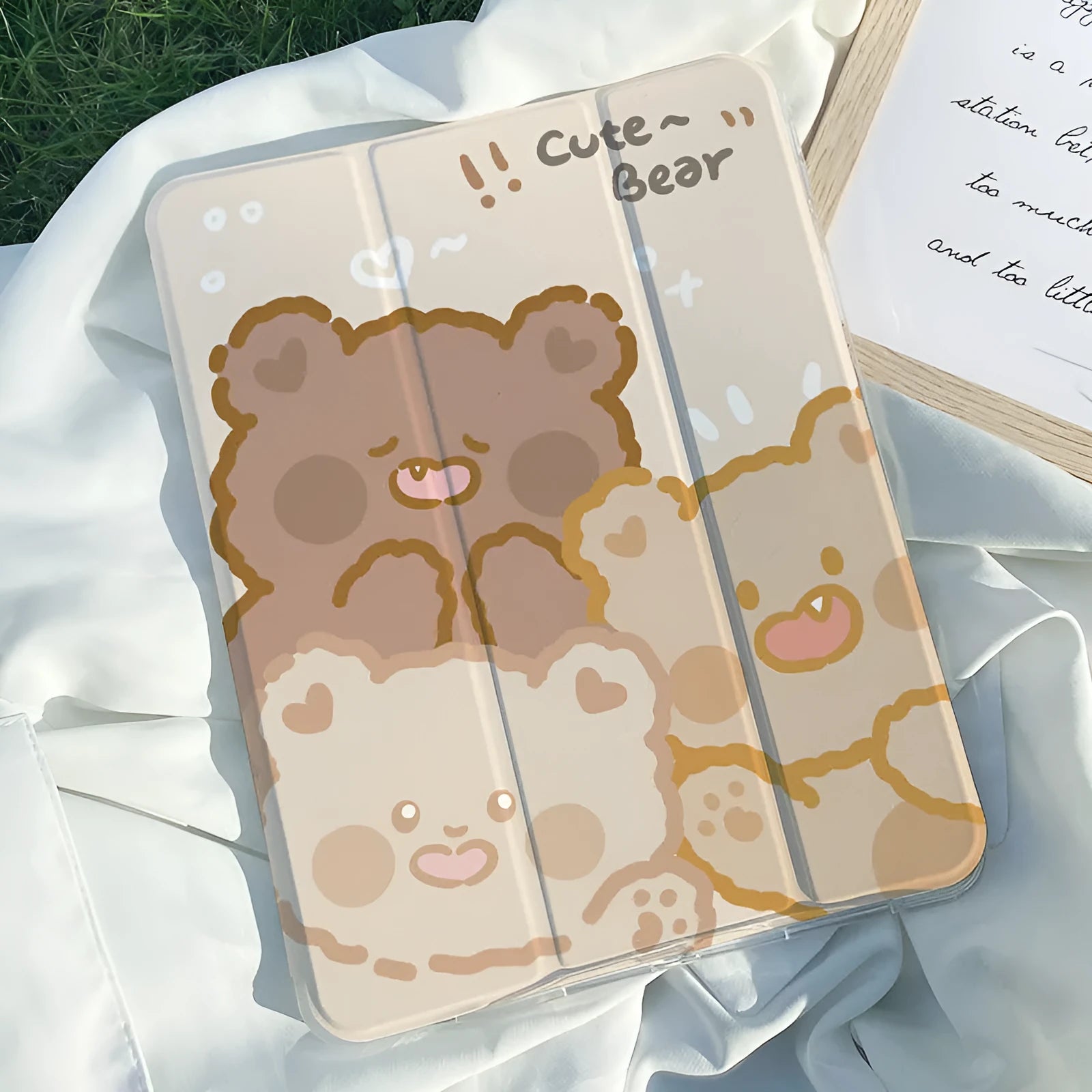 Silicone iPad case with a cartoon rabbit design lying flat, showing its tri-fold shape.
