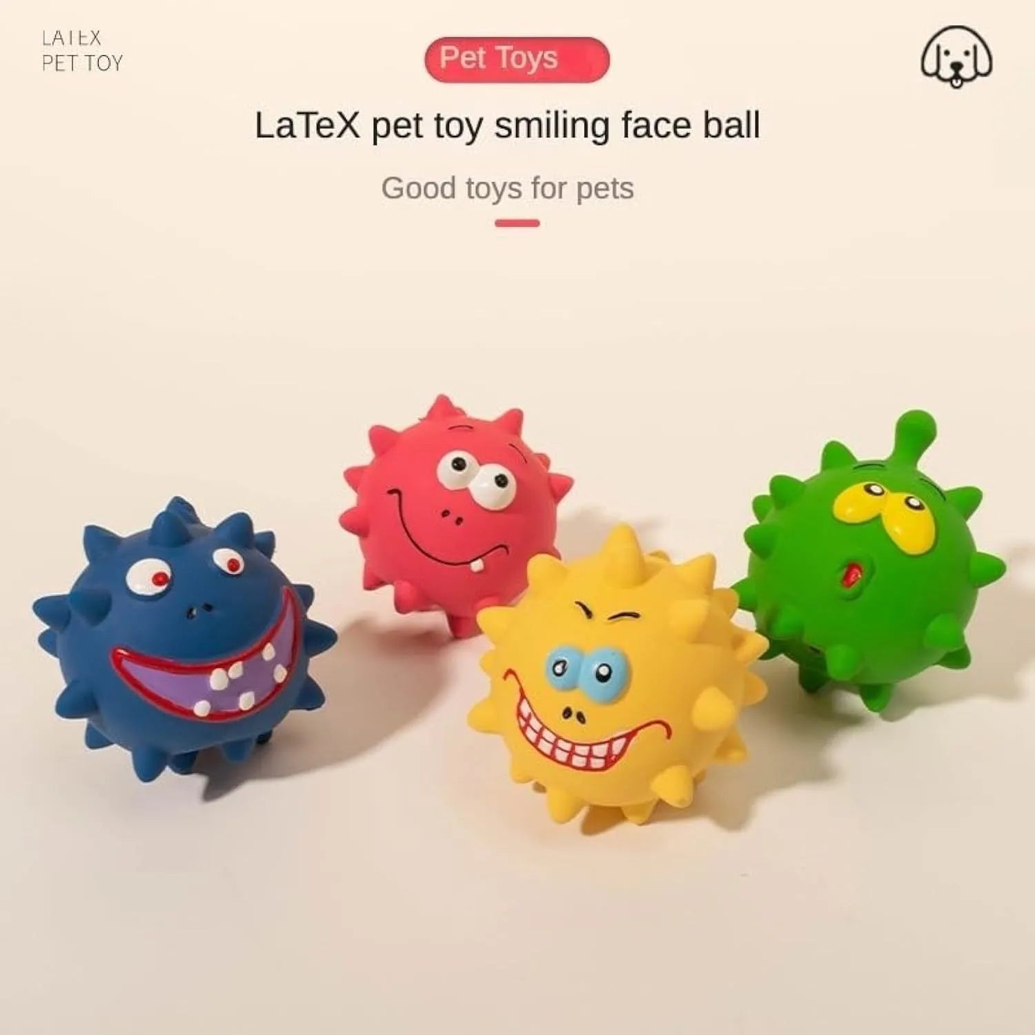 Set of four colourful latex squeaky dog balls with cute faces, shown next to a dog.