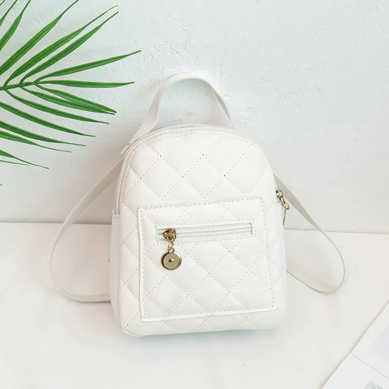 Hard square girls backpack with embroidered floral design in pink colour.