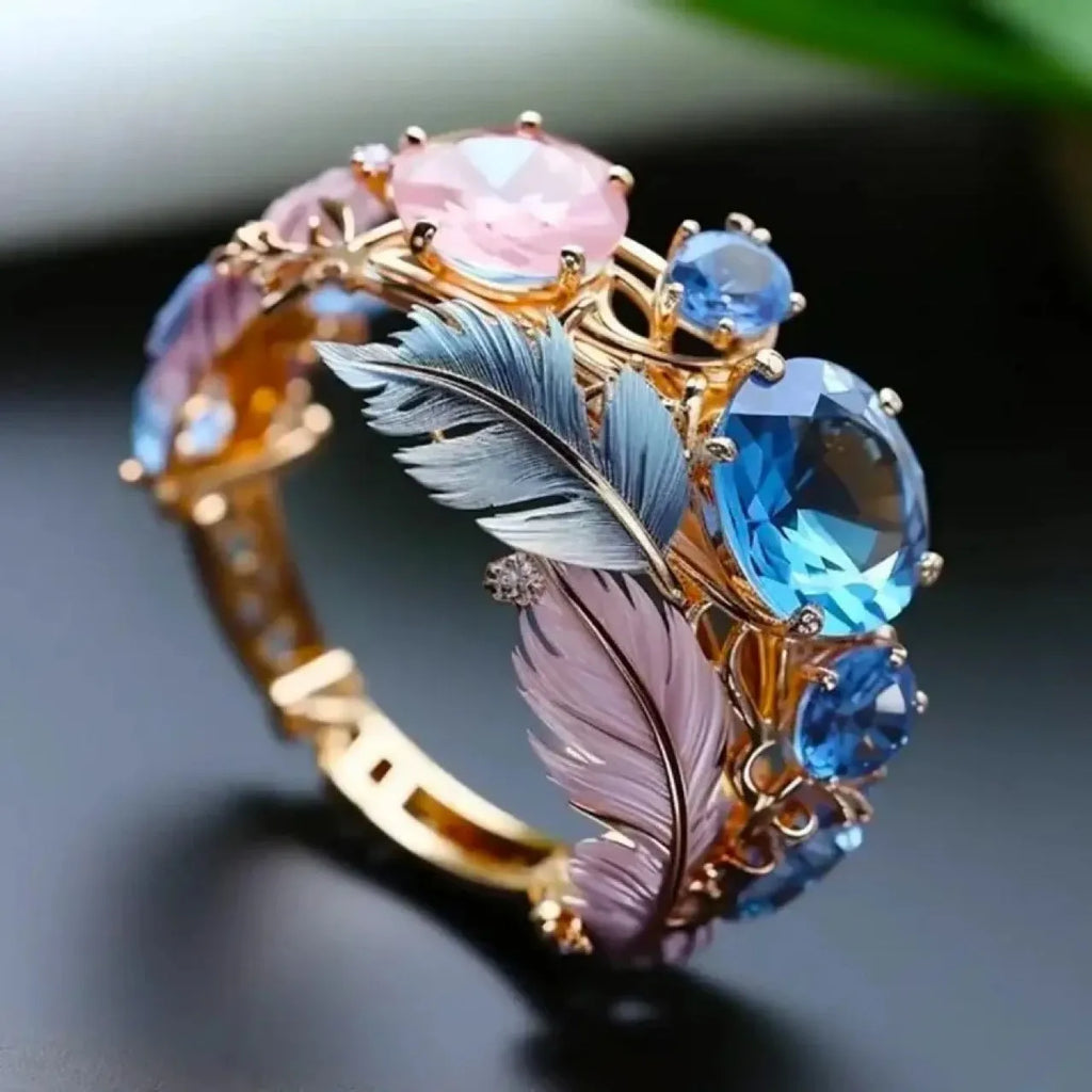 Gold embossed feather ring with colourful zircon geometric design on brass