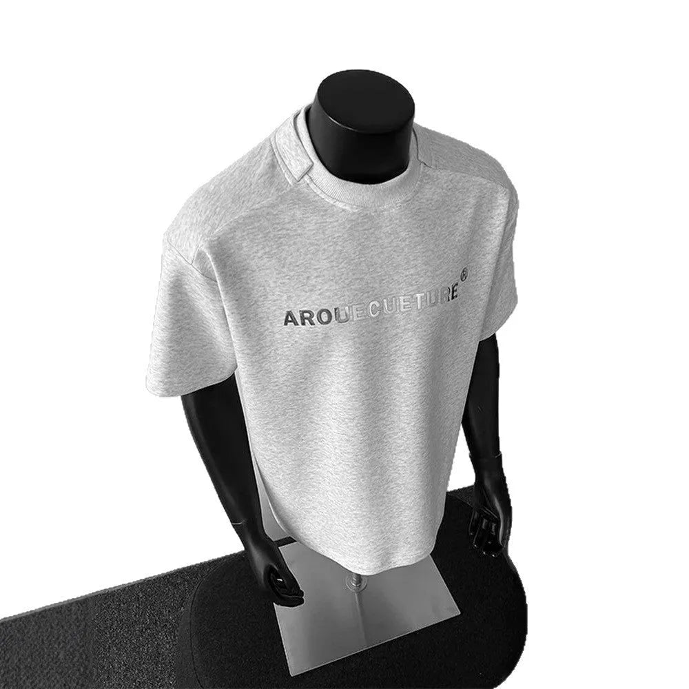 Men's loose fit short sleeve cotton shirt in light grey on a hanger