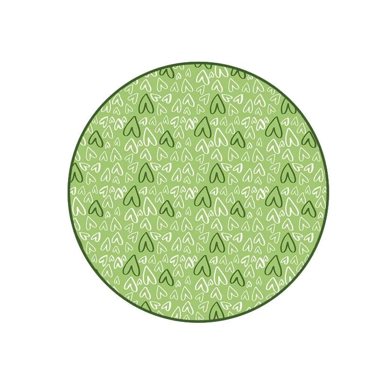 Green cloth cat toy hunting cover with USB-powered balls on a flat surface