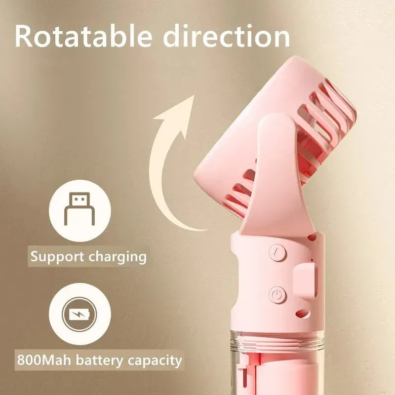 Handheld misting fan with transparent water tank showing multiple colour options including black, white, and pink