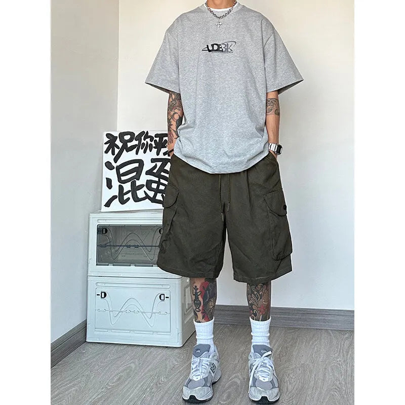 Straight-leg casual polyester shorts in a loose fit, shown in khaki colour.