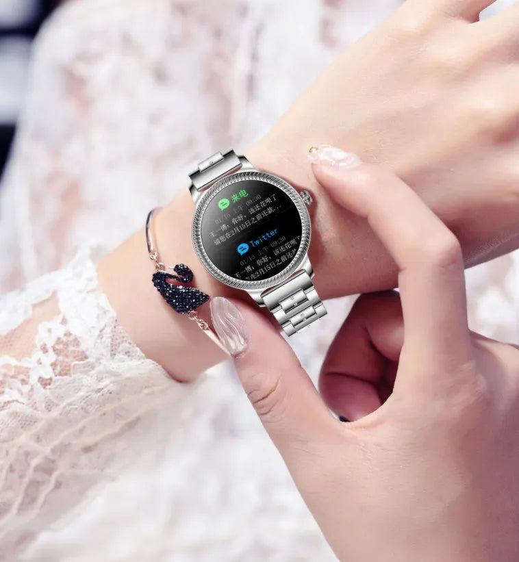 AK38 ladies smart watch with stainless steel Milanese strap and 1.09-inch colour screen.