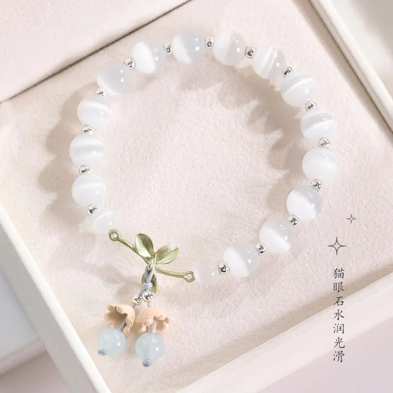 Women's opal beaded bracelet with diamond-shaped cat's eye stones in multiple colour options