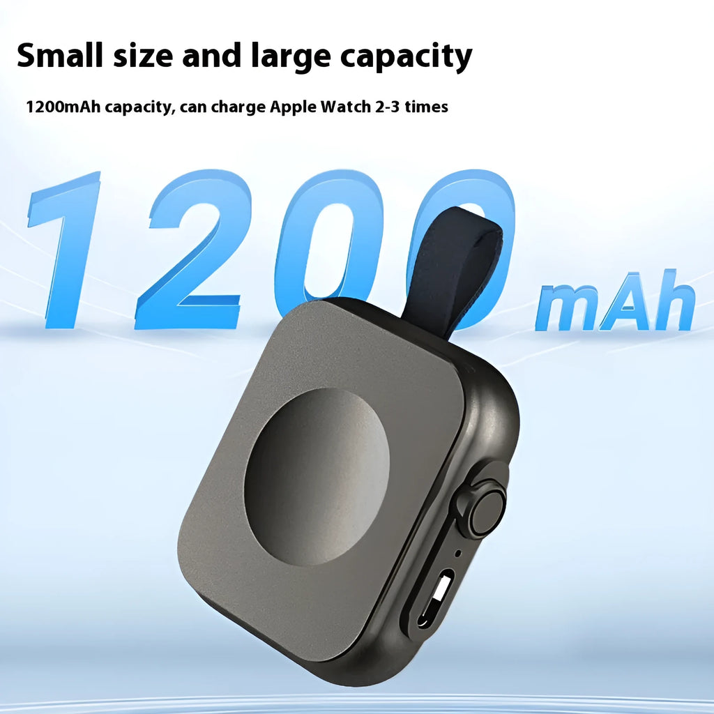 Mini magnetic mobile wireless power supply in black on a table with a smartphone on top
