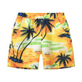 Multi-colour printed beach shorts with elastic waist for children on a summer background