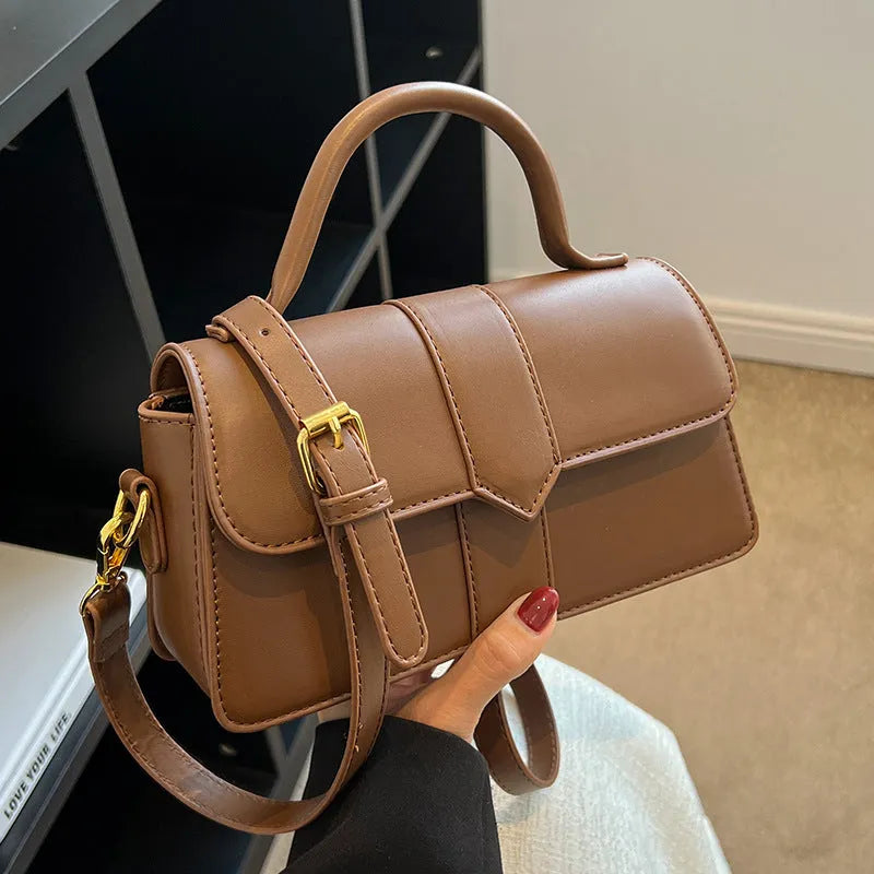 Women's horizontal square messenger bag in PU material with internal file organisation
