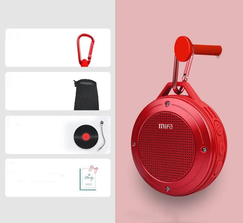 Portable Bluetooth speaker in grey silicone case with button controls, USB port, and compact size