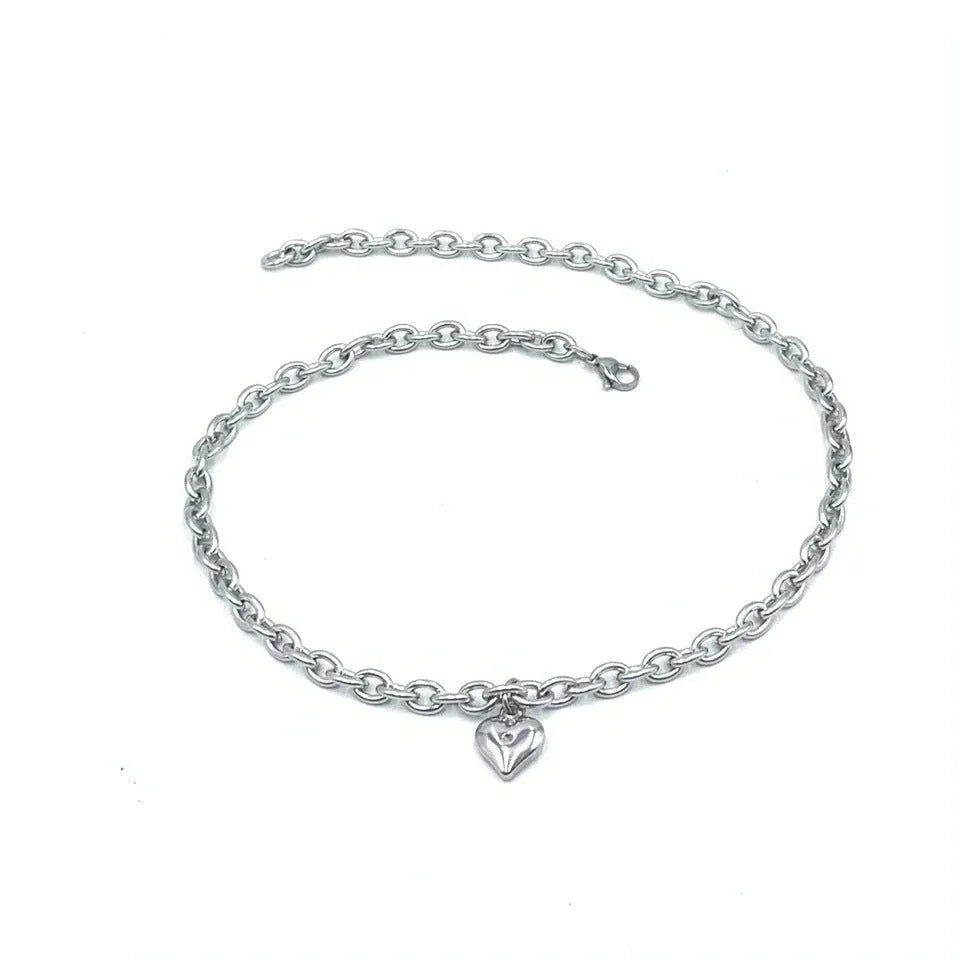 Stainless steel pet pendant necklace with love heart charm showing cat or dog motif on curb chain