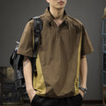 Brown men's half-zip stand collar casual shirt with short sleeves on a hanger.